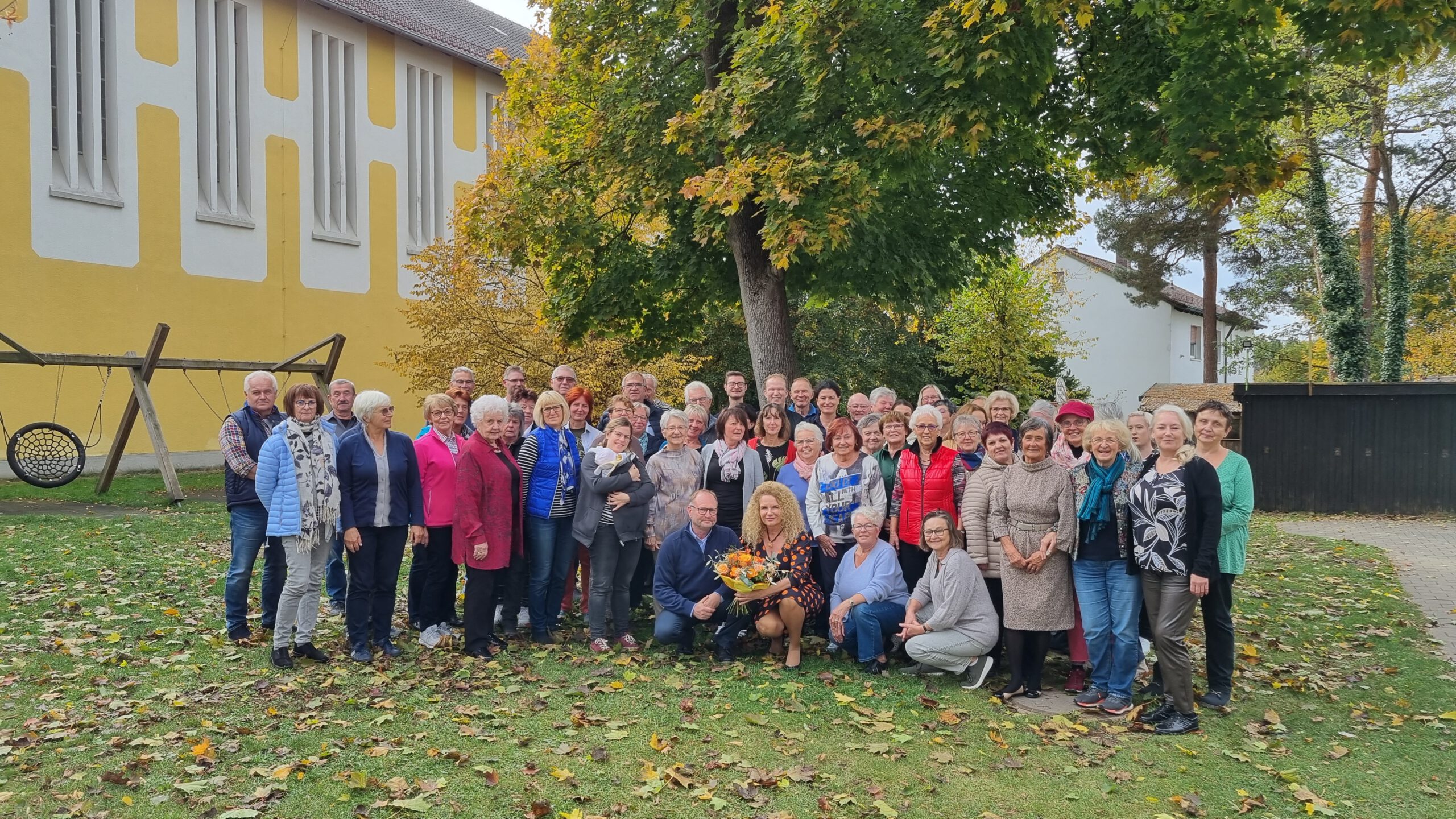 a group of people posing for a photo